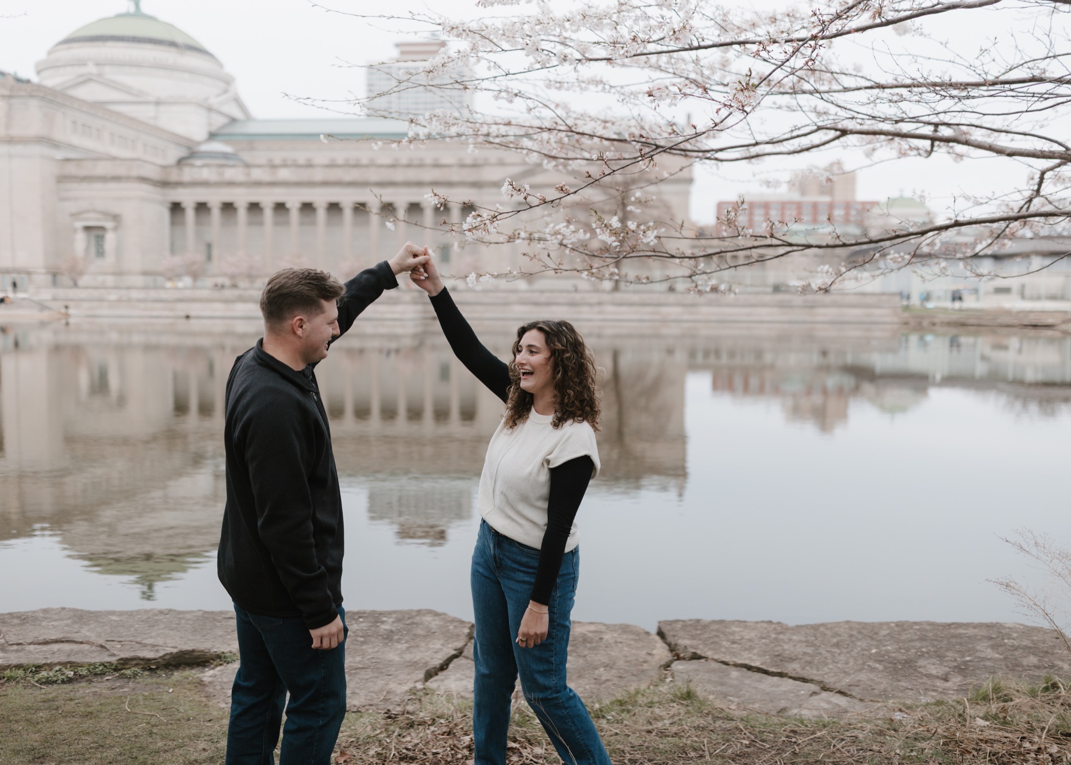 Couple beneath cherry blossoms photographed by Summer Lecas